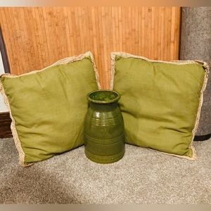 2 olive green pillows and 1 olive green vase